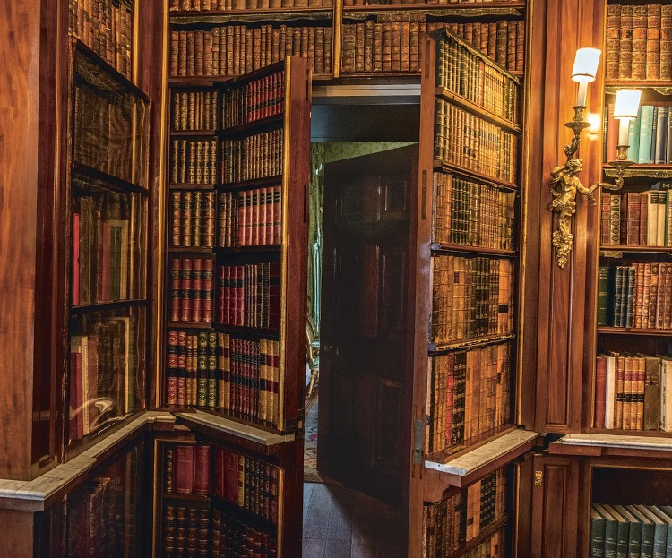 [Image: hidden room behind a bookshelf]